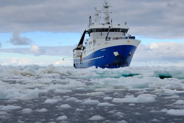 RV Tangaroa steams through the sea ice in Antarctica