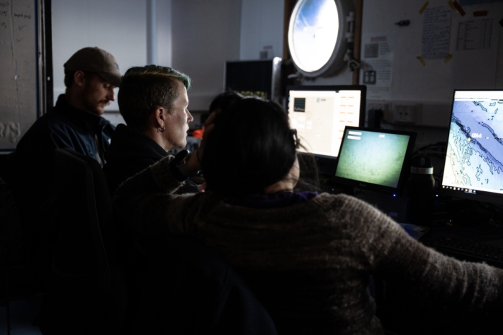 Researchers observing the DTIS.