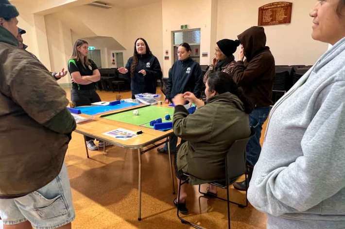 Tauranganui Marae game workshop held at Tuakau Hall in July 2025, part of an iwi-led climate change adaptation information hui. 