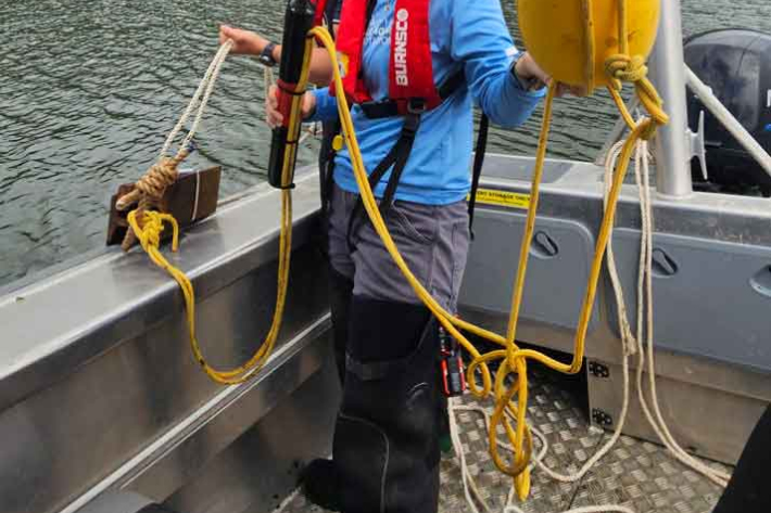 University of Waikato Dr Jenni Stanley and Waikato Regional councils Gordon Tieman deploying one of the SoundTrap ST600 hydrophones in Lake Whakamaru. 