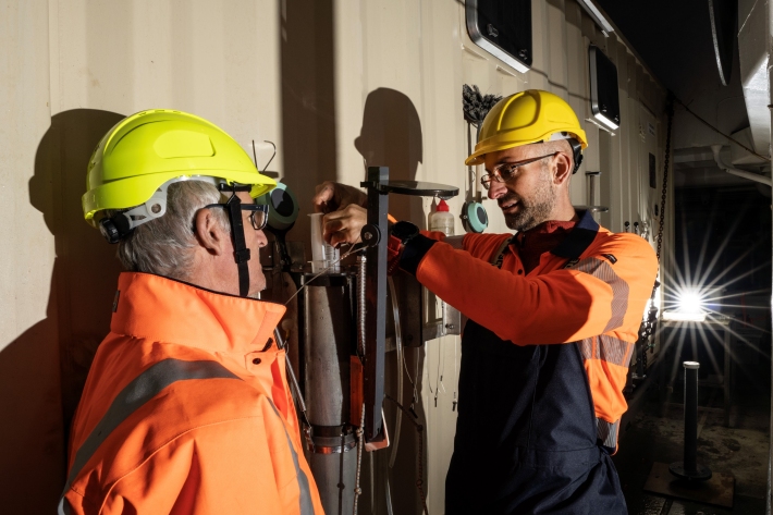 Marine Biologist, Daniel Leduc with a sediment sample which can contain hundreds of small specimens, such as nematodes. 