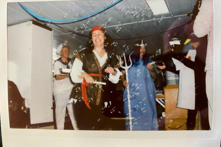 Teams celebrate crossing the 60 