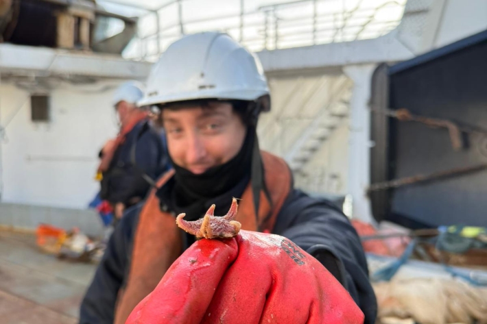 Marco Grillo with a specimen collected during the voyage 