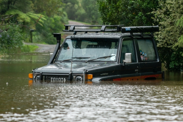 Flooded vehicle in Waimauku Auckland during Cyclone Gabrielle.