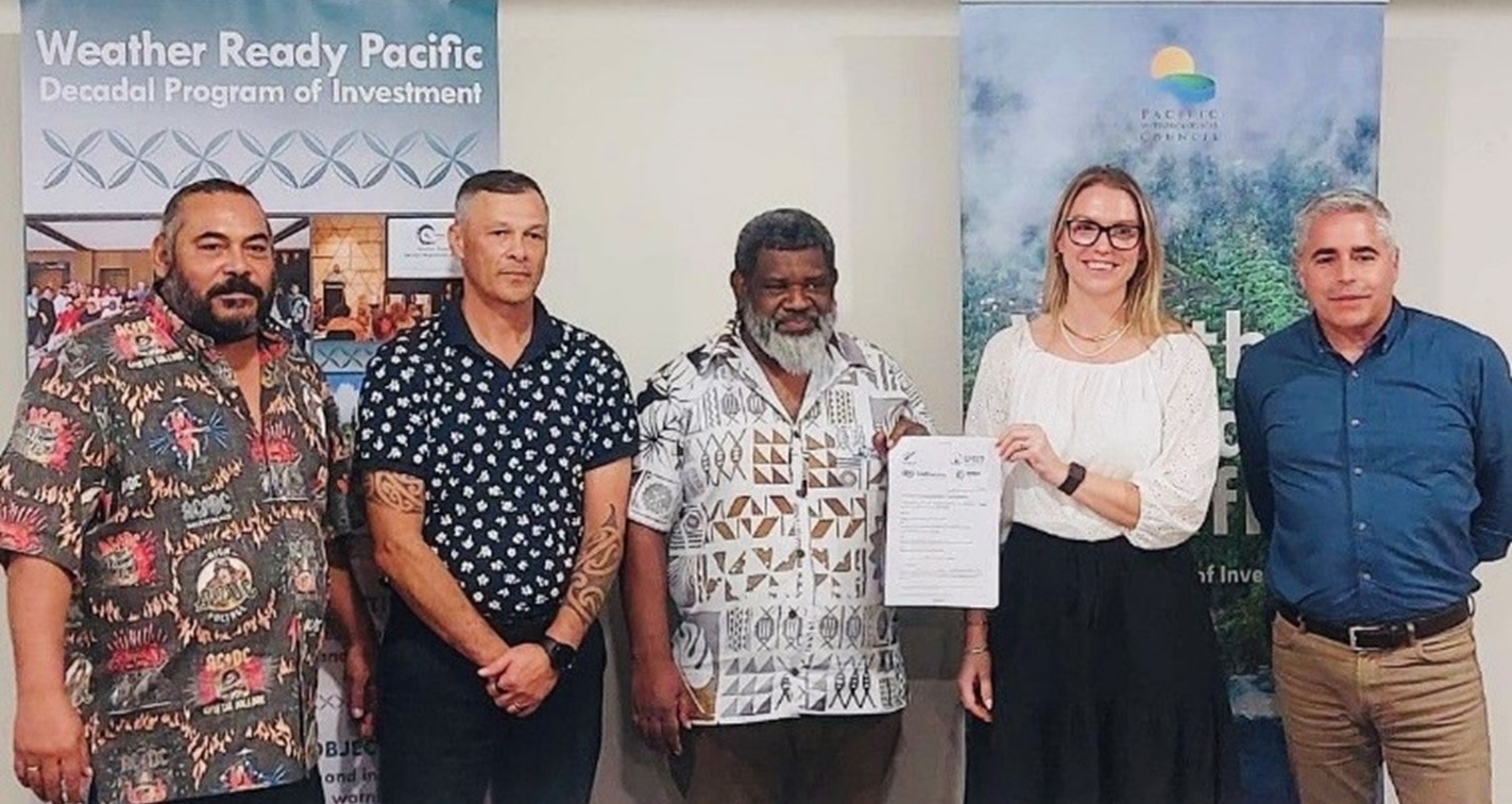 Ofa Fa’anunu of WRP, Trevor Shailer of NZ MetService, Salesa Nihmei of SPREP, Rebekah Robertson of MFAT and Connon Andrews of Earth Sciences NZ celebrate collective partnership for a Weather Ready Pacific 
