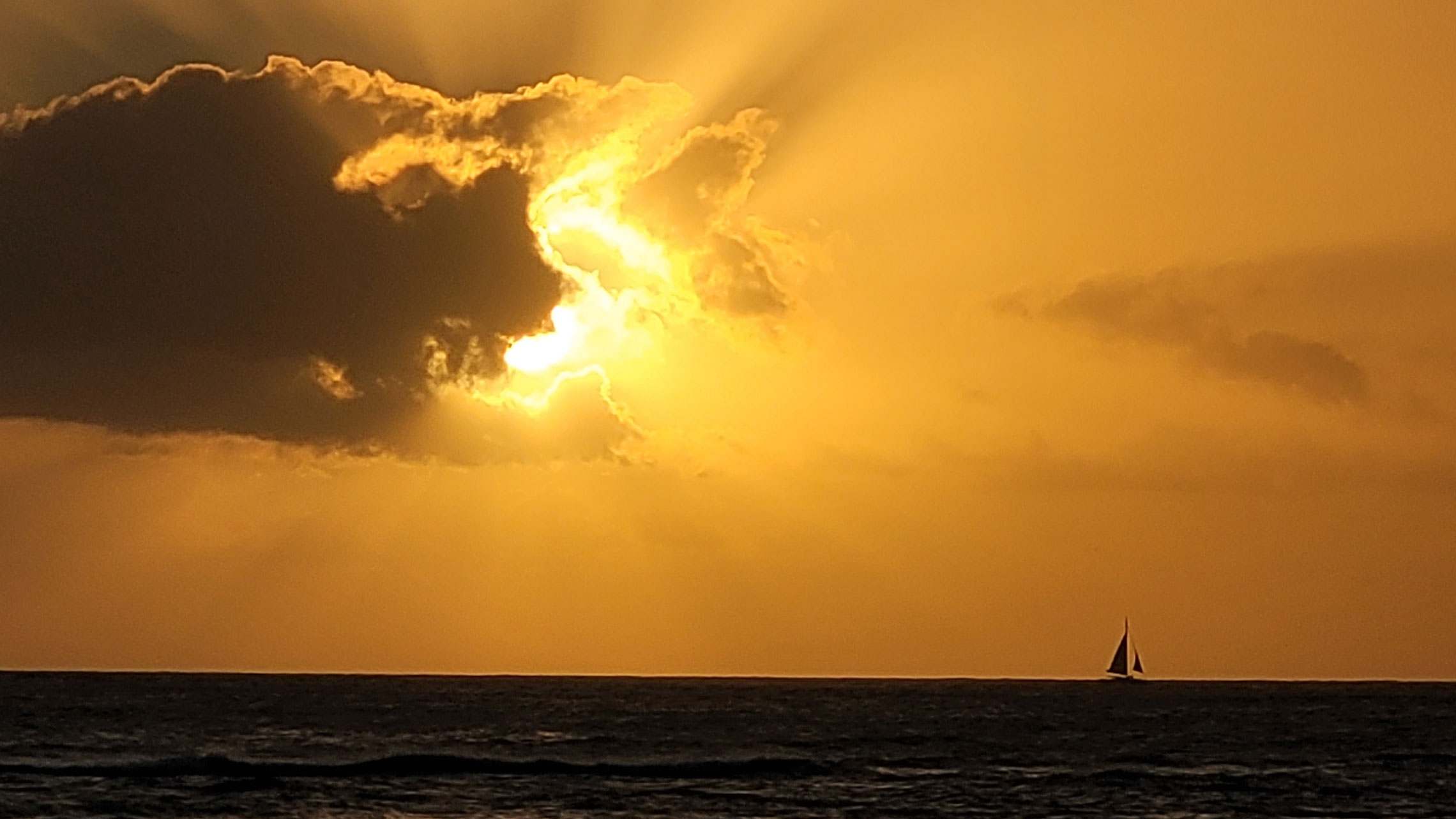 A sailing ship offshore of Honolulu 