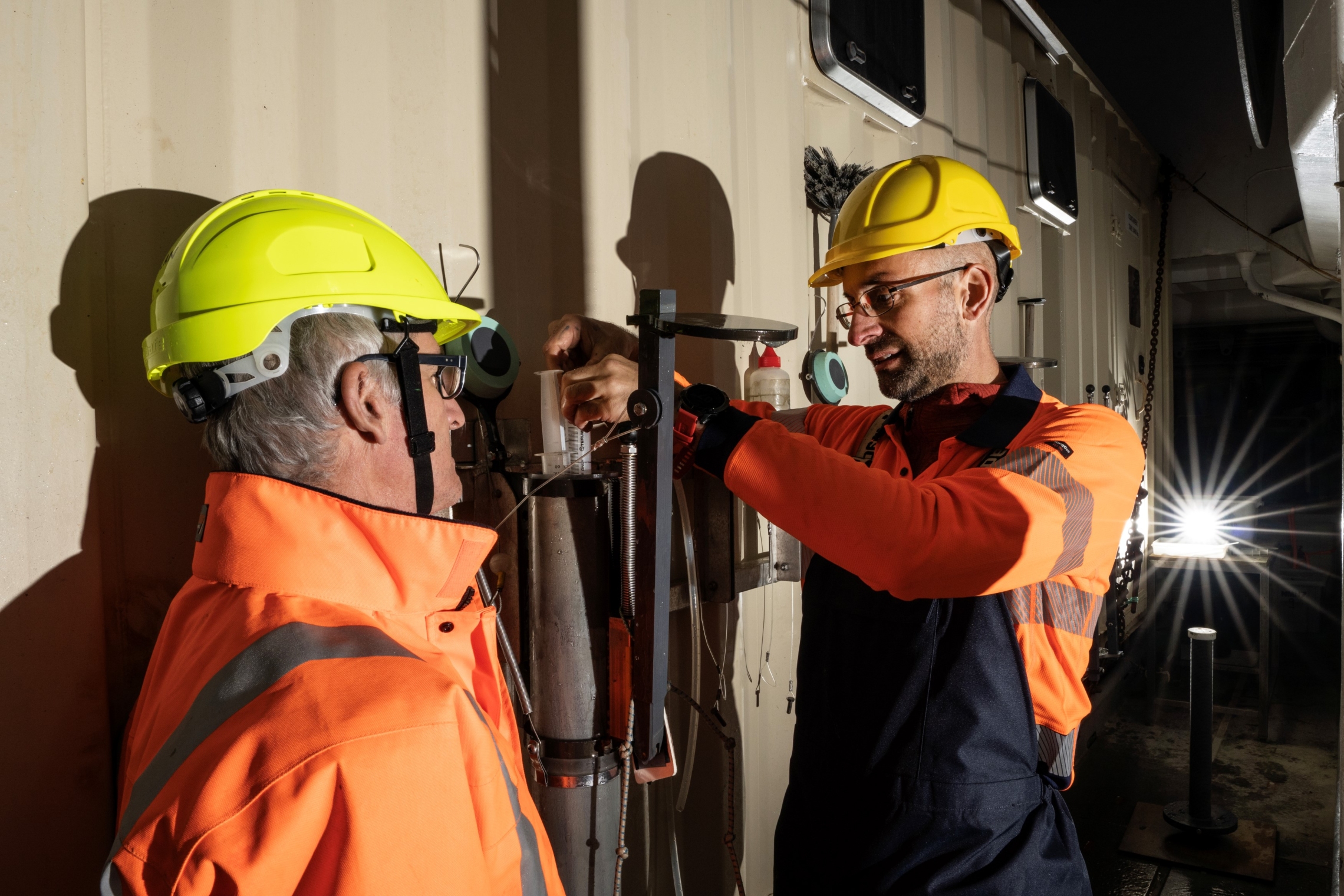 Marine Biologist, Daniel Leduc with a sediment sample which can contain hundreds of small specimens, such as nematodes. 