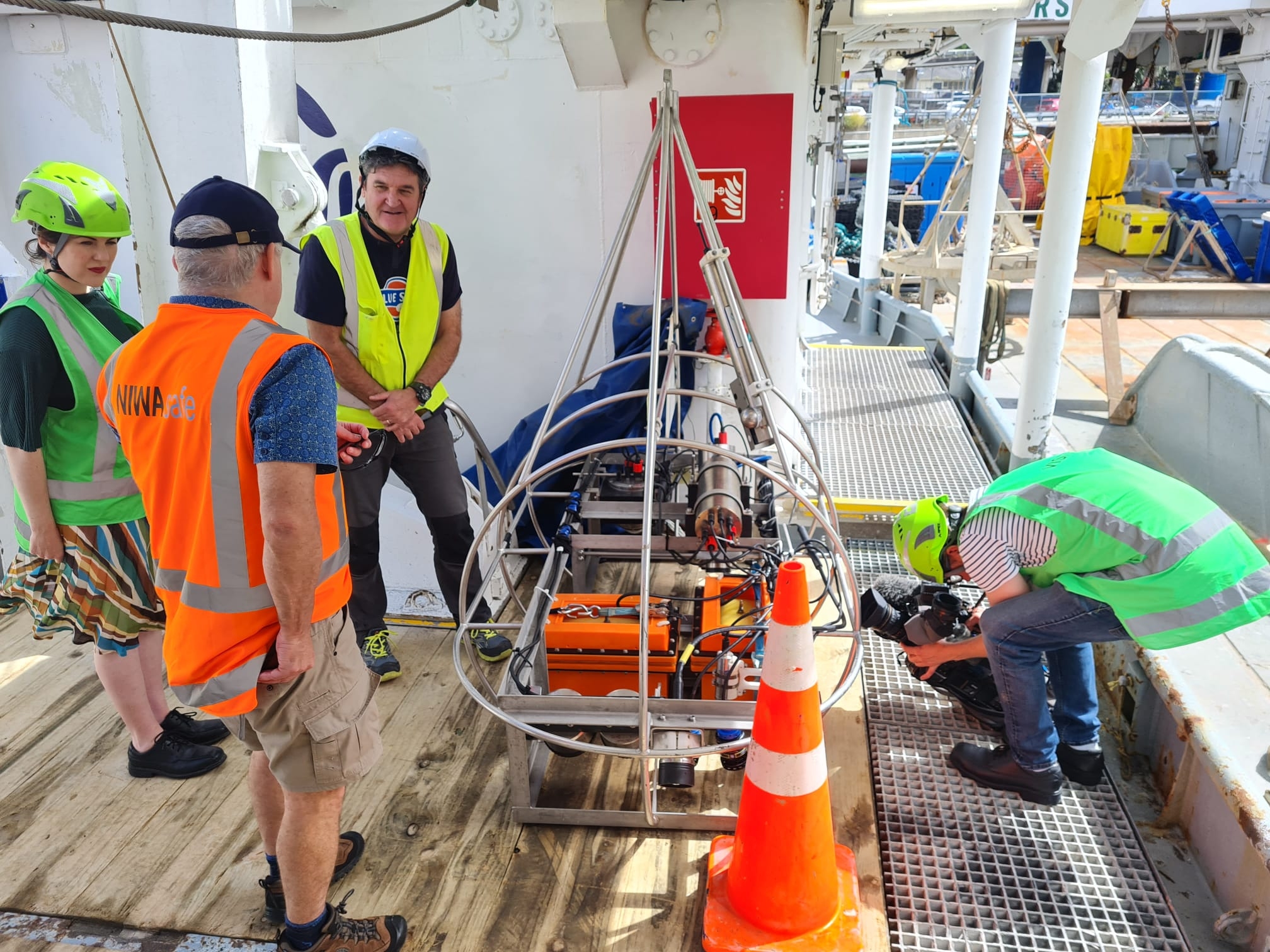 Showing media around the vessel on return to Port